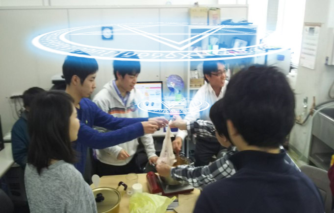 Students in lab hold a dubious ceremony around the pot…. 