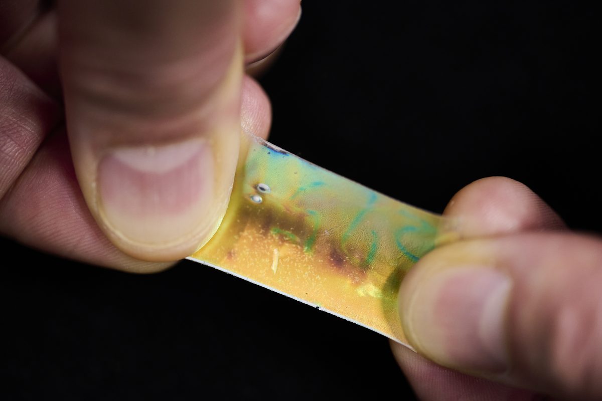 A polymer film that changes color when stretched